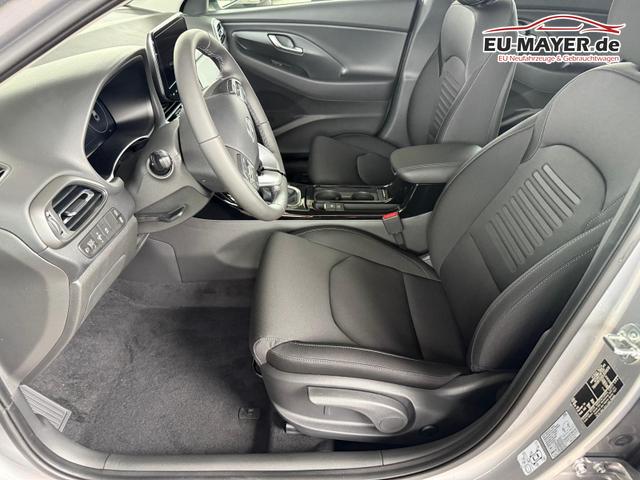 Hyundai i30 Fastback E-Motion 1.5 T-GDi mHev / Navi PDC V.&H + Kamera LED m.Kurvenl./ Sitz Lenkradheizung Klimaautom./ Alu 16" 