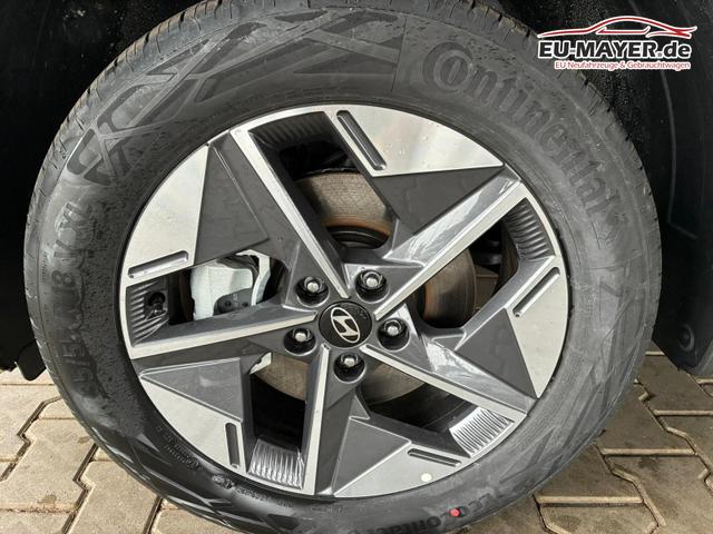 Hyundai TUCSON E-Motion 1.6 T-GDi 2WD HEV / Panoramadach ACC LED Sitz + Lenkradheizung Navi PDC V&H Kamera Alu 18" 