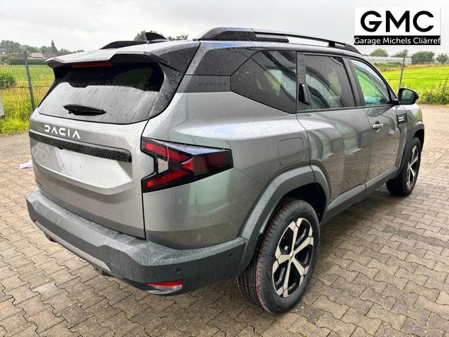 Dacia Bigster Journey FULL-HYBRID 155 (Benzin+Elektro), GRAU-METALLIC/DACH SCHWARZ, BEHEIZTE FRONTSCHEIBE, SITZHEIZUNG, LENRADKRADHEIZUNG, TOTER-WINKEL-ASSISTENT, PARKSENSOREN VORN/HINTEN, MULTIVIEW-KAMERA, 18" ALUFELGEN, PRIVACY-GLAS, NAVIGATION, ELEKTR. HECKKLAPPE, ACC 