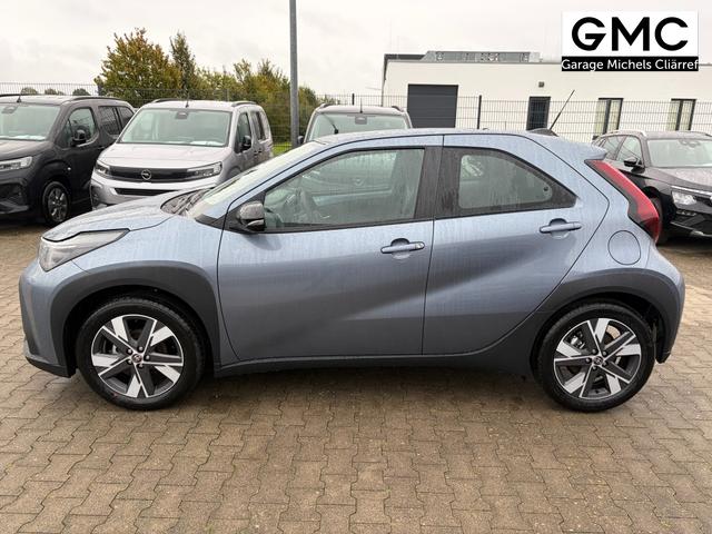 Toyota Aygo X Play 1.5 Hybrid 115PS CVT/AUTOMATIK, Celestite Grey Metallic , 3 Jahre Garantie, 17" Alufelgen, Sitzheizung, R&uuml;ckfahrkamera, Klimaautomatik, Audiosystem 9" + Smartphone-Integration, Lederlenkrad, ACC, ZV mit Fernbedienung 
