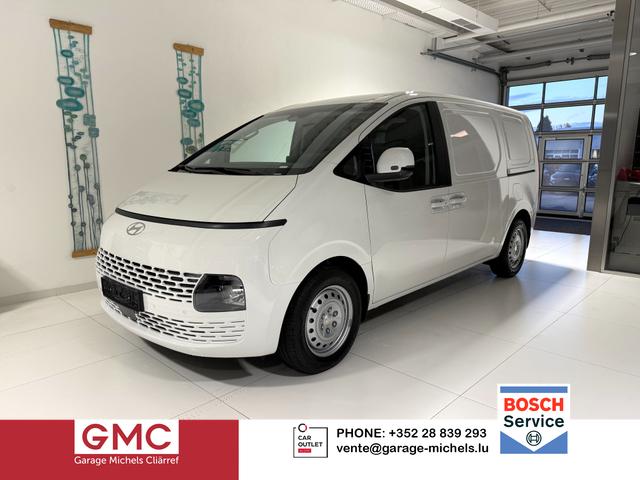 Hyundai Staria - Kastenwagen 1.6 T-GDi HEV 165 kW (224 PS) Sitz-Paket, Lenkradheizung, Sitzheizung, Klimaautomatik, DAB, Navigationssystem, Android Auto, Apple CarPlay, Einparkhilfe vorne und hinten, R&uuml;ckfahrkamera, 17 Zoll Stahlfelgen, Reserverad, uvm.