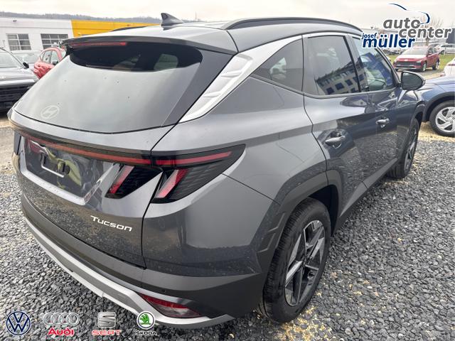 Hyundai / TUCSON / Grau / / / 18 ALU KLIMAAUTOMATIK TOTWINKEL NAVI SHZ RFK PDC