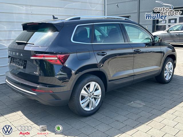 Skoda Karoq Extra 2.0 TDI DSG 4x4 AHK*Android Auto*SHZ*ACC*Keyless*Kamera*17" LM* 2Z Klimaauto*SUNSET 