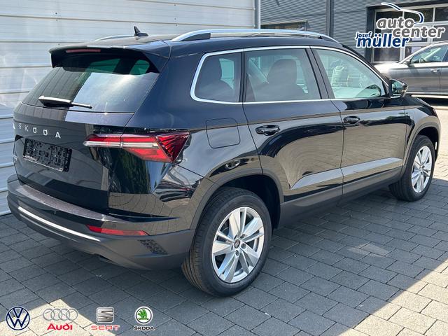 Skoda Karoq Extra Plus 2.0 TDI DSG AHK*Android Auto*Matrix*E-Heck*SHZ*ACC*Keyless*Kamera*17" LM* 2Z Klimaauto*SUNSET 
