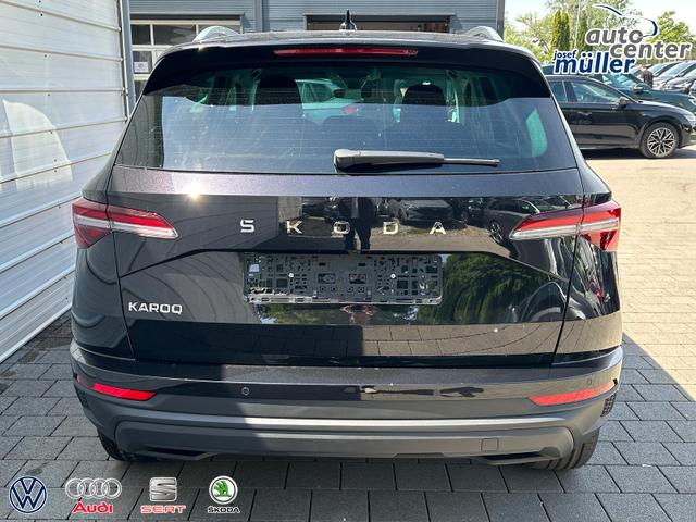 Skoda Karoq Extra Plus 2.0 TDI DSG AHK*Android Auto*Matrix*E-Heck*SHZ*ACC*Keyless*Kamera*17" LM* 2Z Klimaauto*SUNSET 