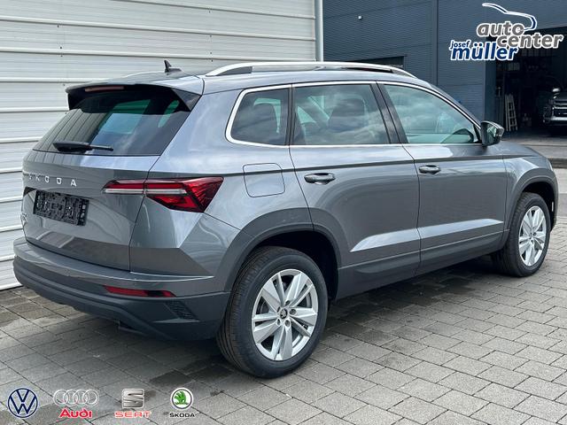 Skoda Karoq Extra 2.0 TDI DSG AHK*Android Auto*SHZ*ACC*Keyless*Kamera*17" LM* 2Z Klimaauto*SUNSET 