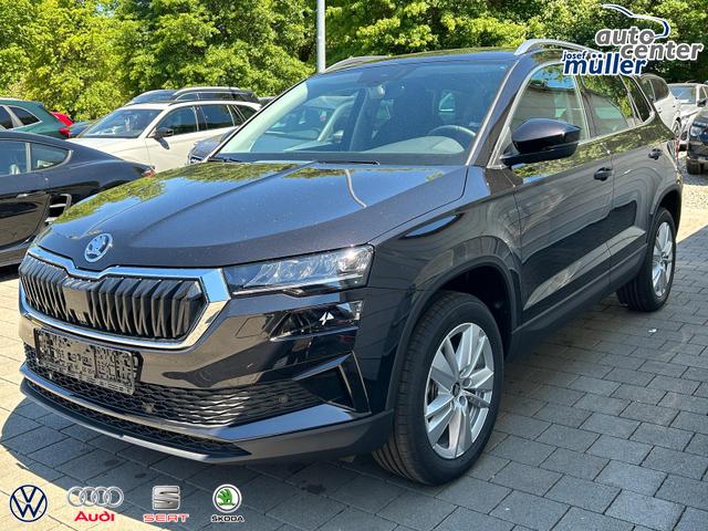 Skoda Karoq Extra 2.0 TDI DSG AHK*Android Auto*SHZ*ACC*Keyless*Kamera*17" LM* 2Z Klimaauto*SUNSET 