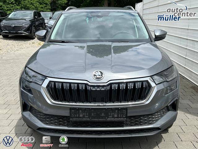 Skoda Karoq Extra Plus 2.0 TDI DSG 4x4 AHK*Android Auto*Matrix*E-Heck*SHZ*ACC*Keyless*Kamera*17" LM* 2Z Klimaauto*SUNSET 