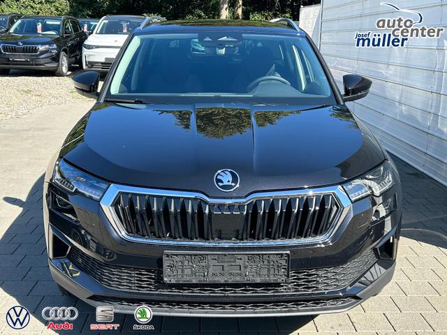 Skoda Karoq Extra Plus 2.0 TDI DSG AHK*Android Auto*Matrix*E-Heck*SHZ*ACC*Keyless*Kamera*17" LM* 2Z Klimaauto*SUNSET 
