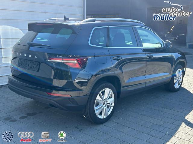 Skoda Karoq Extra Plus 2.0 TDI DSG AHK*Android Auto*Matrix*E-Heck*SHZ*ACC*Keyless*Kamera*17" LM* 2Z Klimaauto*SUNSET 