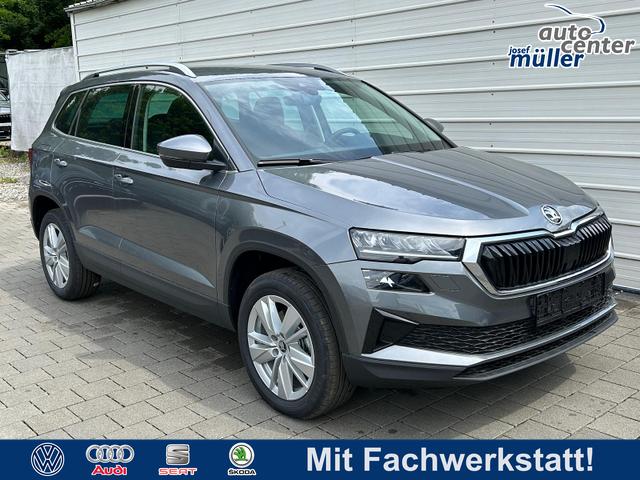 Skoda Karoq - Extra 2.0 TDI DSG AHK*Android Auto*SHZ*ACC*Keyless*Kamera*17" LM* 2Z Klimaauto*SUNSET