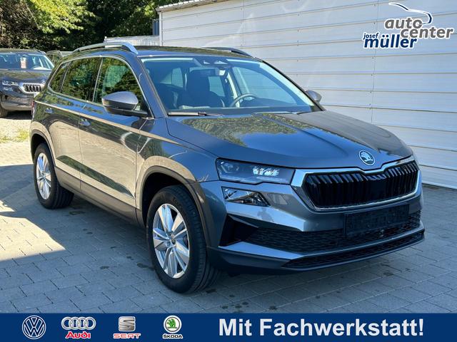 Skoda Karoq - Extra Plus 2.0 TDI DSG 4x4 AHK*Android Auto*Matrix*E-Heck*SHZ*ACC*Keyless*Kamera*17" LM* 2Z Klimaauto*SUNSET
