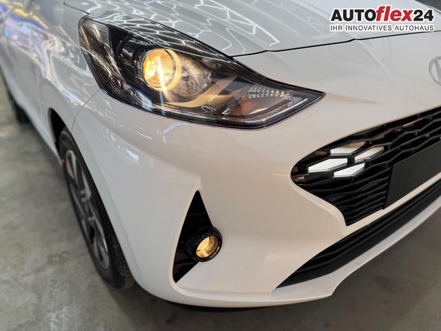 Hyundai i10 PREMIUM AUT SHZ KLIMAAUTOMATIK AMBIENTE ALU RFK PDC NAVI 