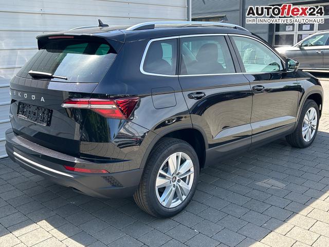 Skoda Karoq Extra Plus 2.0 TDI DSG AHK*Android Auto*Matrix*E-Heck*SHZ*ACC*Keyless*Kamera*17" LM* 2Z Klimaauto*SUNSET 