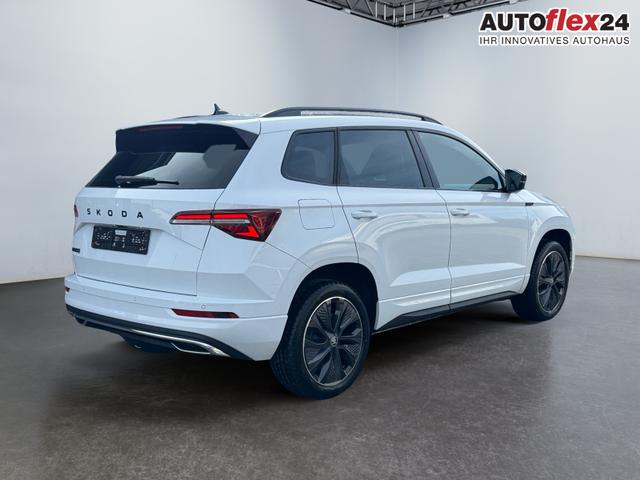 Lagerfahrzeug Skoda Karoq - 1,5 TSI DSG Sportline 2ZKli AHK ACC Canton PDC Kam 19Zo 5JG