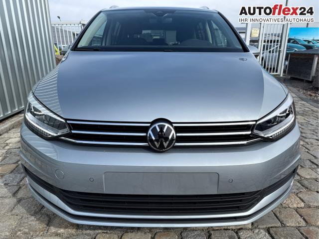 Vorlauffahrzeuge Volkswagen Touran - Comfort Plus Edition 1.5 TSI EVO2 110kW/150PS 7DSG 7-Sitzer-el. AHK inkl. TrailerAssist-Navi-LED-Kessy-R&uuml;ckfahrkamera-Parklenkassist-el.Heckklappe-ACC-3-Zonen Klimaautomatik-Winterpaket-Chrompaket-17''Alu-sofort verf&uuml;gbar