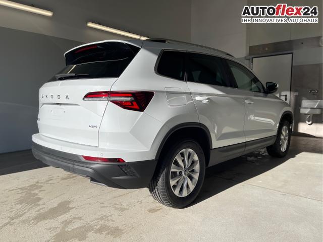 Skoda / Karoq / Weiß / / / 150PS TDI DSG 4x4 AHK+Navi+ACC+Kamera+Sitzheiz+eHeck+GV5