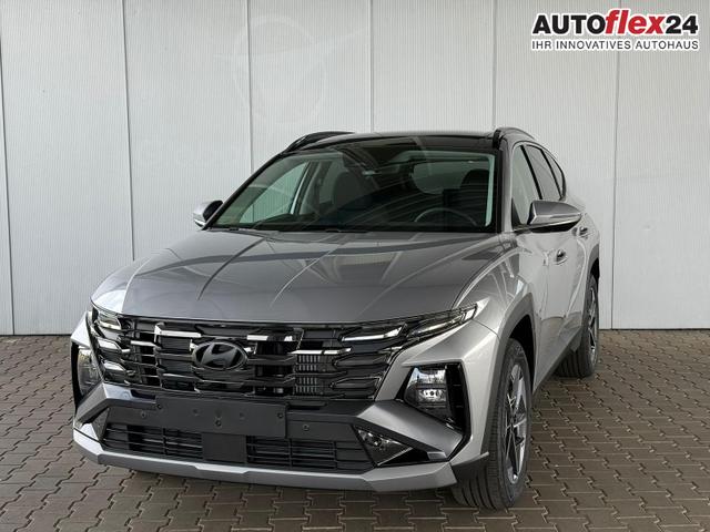 Gebrauchtfahrzeug Hyundai TUCSON - E-Motion 1.6 T-GDI 2WD 48V DCT / Panoramadach ACC Sitz   Lenkradheizung LED Navi PDC V&H Kamera Alu 18"