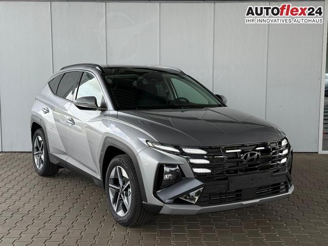 Hyundai TUCSON E-Motion 1.6 T-GDI 2WD 48V DCT / Panoramadach ACC Sitz + Lenkradheizung LED Navi PDC V&H Kamera Alu 18" 