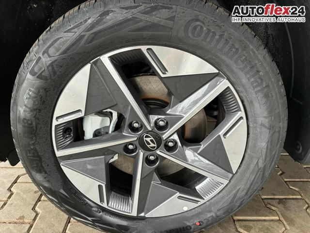 Hyundai TUCSON E-Motion 1.6 T-GDi 2WD HEV / Panoramadach ACC LED Sitz + Lenkradheizung Navi PDC V&H Kamera Alu 18" 