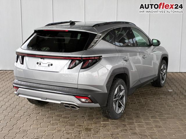 Hyundai TUCSON E-Motion 1.6 T-GDi 2WD HEV / Panoramadach ACC LED Sitz + Lenkradheizung Navi PDC V&H Kamera Alu 18" 