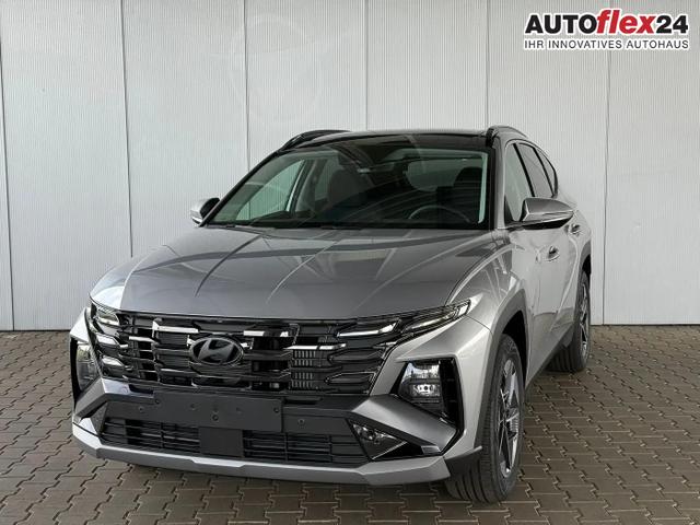 Gebrauchtfahrzeug Hyundai TUCSON - E-Motion 1.6 T-GDI 2WD 48V DCT / Panoramadach ACC Sitz   Lenkradheizung LED Navi PDC V&H Kamera Alu 18"
