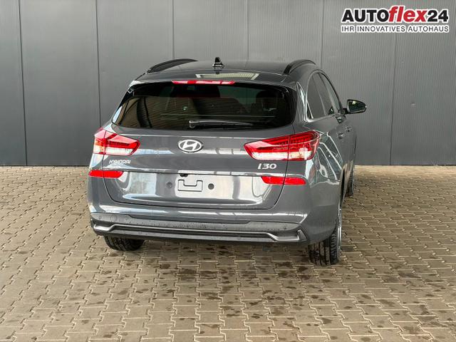 Hyundai i30 Kombi Comfort Plus 1.0 TGDI DCT/ Navi / Sitz + Lenkradheizung PDC V&H Kamera LED Alu 17" 