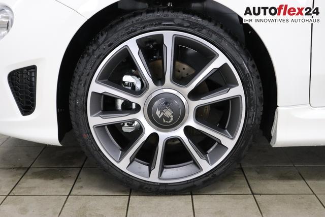 595 & 695 MY23 595 1.4 T-Jet 121 kW (165 PS) MT 268 - Gara Wei&szlig; 557 - Integral-Sportsitze Leder Schwarz "3L3 Komfort-Paket: Bi-Xenon Scheinwerfer, Beats&reg; Audio Soundsystem 3L4 Tech-Paket 5CA Gara Wei&szlig; 9SV, Gutschrift Mopar BMC Sportluftfilter und Tankdeckel aus Aluminium A67 Linea Turismo"