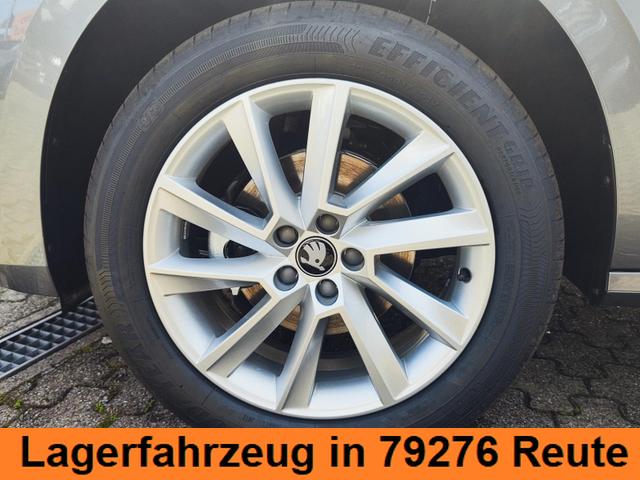 Skoda Kamiq Top Selection L 115PS DSG Automatik mit elektrischer Heckklappe Tempomat LED Scheinwerfer Sitzheizung Lenkradheizung Einparkhilfe vorne+hinten R&uuml;ckfahrkamera DAB Radio Kessy Licht und Regensensor 