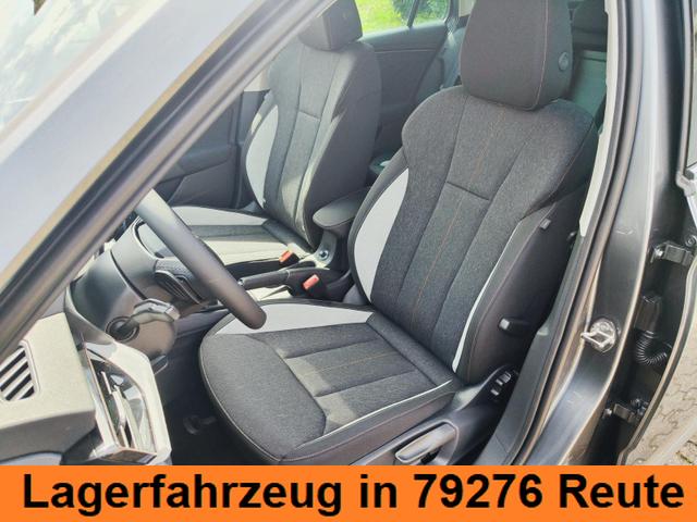 Skoda Kamiq Top Selection L 115PS DSG Automatik mit elektrischer Heckklappe Tempomat LED Scheinwerfer Sitzheizung Lenkradheizung Einparkhilfe vorne+hinten R&uuml;ckfahrkamera DAB Radio Kessy Licht und Regensensor 
