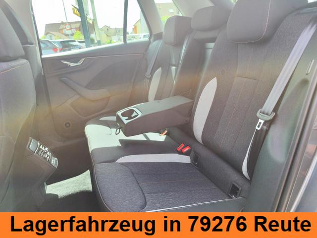 Skoda Kamiq Top Selection L 115PS DSG Automatik mit elektrischer Heckklappe Tempomat LED Scheinwerfer Sitzheizung Lenkradheizung Einparkhilfe vorne+hinten R&uuml;ckfahrkamera DAB Radio Kessy Licht und Regensensor 