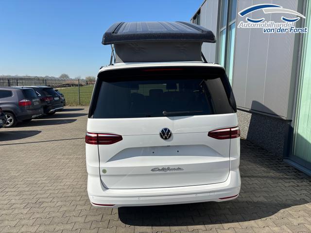 Volkswagen T7 California LAGERFAHRZEUGE "Ocean" LIEFERUNG KOSTENLOS & PREISGARANTIE* 2.0 TDI 150PS DSG, 16" Alu, ELEKTRISCHES Aufstelldach, Privacy-Glas, Climatronic, KÜCHE, Standheizung + FB, Sitzheizung, Park Assist, Parksensoren v/h, Kamera, IQ Light LED-MATRIX, Markise, Side Assist, ACC, Ganzjahresreifen, Radio 10" + App-Connect 