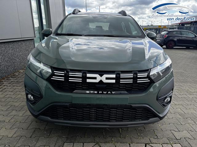 Dacia Sandero Stepway "Expression" 1.0 ECO-G100 LPG-GASANLAGE/BENZIN, Safari-Grün Metallic, MEDIA NAVIGATION 8", Klimaanlage, Parksensoren hinten, Tempomat, Dachreling, Lederlenkrad, 4x elektr. Fensterheber, Armlehne, Spiegel elektr. einstell-/beheizbar, ZV mit Fernbedienung 