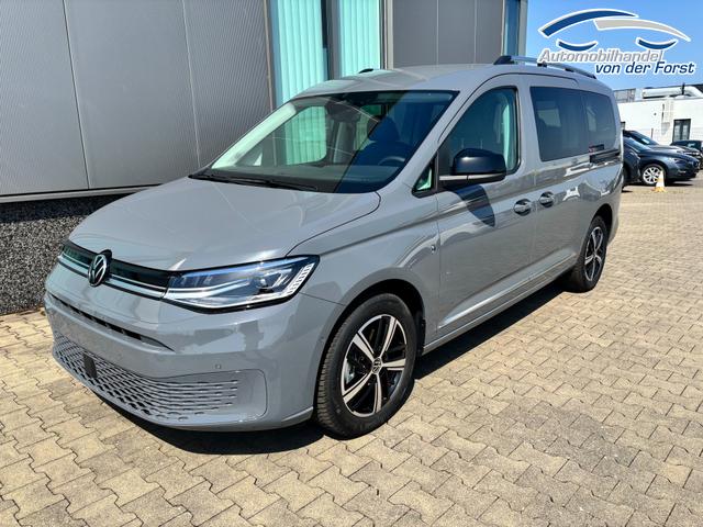 Volkswagen Caddy MAXI (NEUES MODELL) - BEHINTERTENUMBAU "Style" (NEUES MODELL) PREISGARANTIE & KOSTENLOSE LIEFERUNG 1.5 TSI 115PS DSG (MAXI, LANGER RADSTAND), 17" Alu, Beh. Frontscheibe, Sitzheizung, Keyless, Privacy-Glas, Alarm, ParkAssist, Parksensoren vorn/hinten, R&uuml;ckfahrkamera, Dachreling, ACC, 2Z-Climatronic, Radio 12,9/AppConnect, LED-Scheinwerfer 