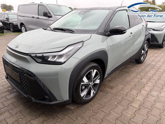 Toyota Aygo X "Pulse / EU-Teamplayer" 1.5 Hybrid 115PS CVT/AUTOMATIK, 3 Jahre Garantie, 17" Alufelgen, Uni-Lackierung Tarragon /Dach schwarz, Privacy-Glas, Sitzheizung, R&uuml;ckfahrkamera, Klimaautomatik, Audiosystem 9" + Smartphone-Integration, Lederlenkrad, ACC, ZV mit Fernbedienung 