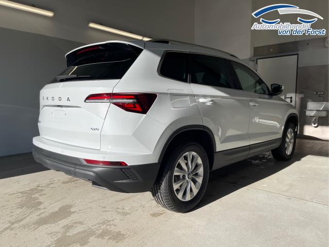 Skoda / Karoq / Wei&szlig; / / / 150PS TDI DSG 4x4 AHK+Navi+ACC+Kamera+Sitzheiz+eHeck+GV5