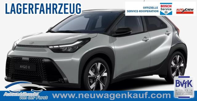 Toyota Aygo X - "Pulse / EU-Teamplayer" LIEFERUNG KOSTENLOS! 1.5 Hybrid 115PS CVT/AUTOMATIK, 3 Jahre Garantie, 17" Alufelgen, Uni-Lackierung Tarragon /Dach schwarz, Privacy-Glas, Sitzheizung, R&uuml;ckfahrkamera, Klimaautomatik, Audiosystem 9" + Smartphone-Integration, Lederlenkrad, ACC, ZV mit Fernbedienung