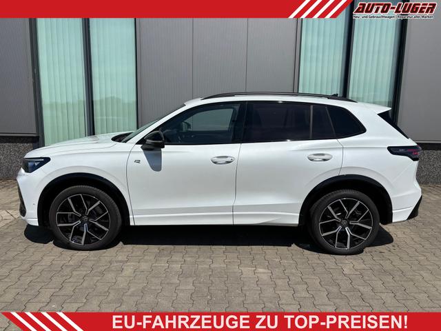 Volkswagen Tiguan - R-Line 2.0 TDI 4MOTION 193PS DSG, PANORAMADACH, ANHÄNGERKUPPLUNG, IQ LIGHT, DESIGN-PAKET Black&Style, NAVI, DCC-Fahrwerk, 20" LEEDS schwarz, Area View, Alarm, Elektr. Heckklappe, Keyless,Massagefunktion, Park Assist, ACC, Sitzheizung, Climatranic