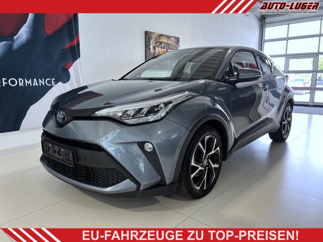 Toyota C-HR - Team Deutschland Navigationssystem, 2-Zonen-Klimaautomatik, Radio, DAB, Bluetooth, Freisprecheinrichtung, Einparkhilfe vorne und hinten, Rückfahrkamera, Sitzheizung, Tempomat, Notbremsassistent, LED-Scheinwerfer, 18-Zoll-Leichtmetallfelgen, uvm.