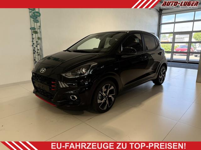 Hyundai i10 - N Line 1.0 T-GDI 66 kW (90 PS) Line-Interieur-Paket, Lenkradheizung, Sitzheizung, Klimaautomatik, Radio, DAB, Apple CarPlay, Android Auto, Navigationssystem, Rückfahrkamera, Verkehrszeichenerkennung, Tempomat, 16 Zoll Leichtmetallfelgen, uvm.