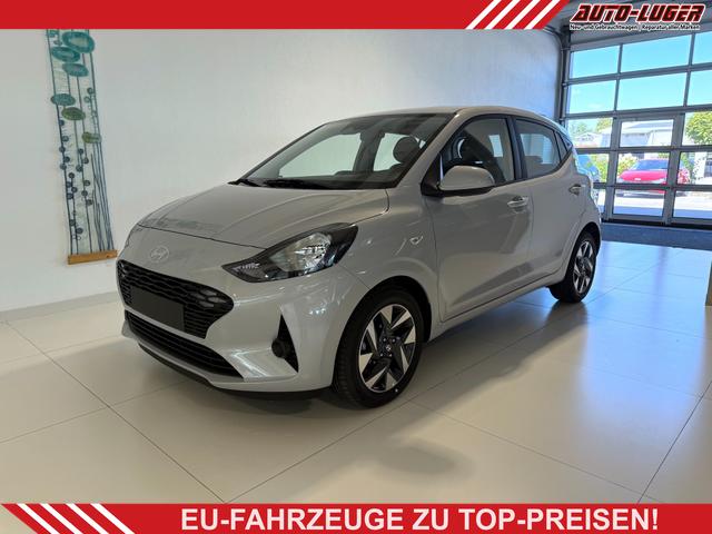 Hyundai i10 - 1.2 MT 57 kW (79 PS) Klimaanlage, Radio, DAB, Bluetooth, Apple CarPlay, Android Auto, Navigationssystem, Einparkhilfe hinten, Rückfahrkamera, elektrische Fensterheber vorne, LED-Tagfahrlicht, 15 Zoll Leichtmetallfelgen, uvm.