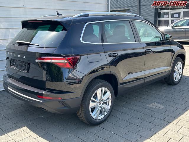 Skoda Karoq Extra Plus 2.0 TDI DSG AHK*Android Auto*Matrix*E-Heck*SHZ*ACC*Keyless*Kamera*17" LM* 2Z Klimaauto*SUNSET 