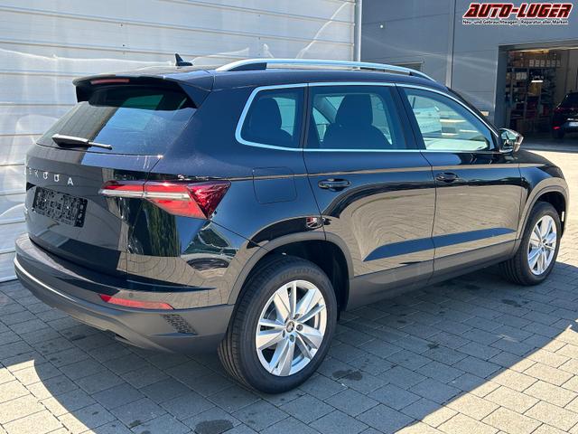 Skoda Karoq Extra 1.5 TSI DSG AHK*Android Auto*SHZ*ACC*Keyless*Kamera*17" LM* 2Z Klimaauto*SUNSET 