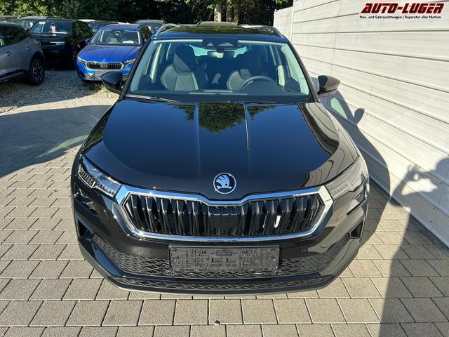 Skoda Karoq Extra Plus 1.5 TSI DSG AHK*Android Auto*Matrix*E-Heck*SHZ*ACC*Keyless*Kamera*17" LM* 2Z Klimaauto*SUNSET 