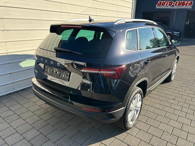 Skoda Karoq Extra Plus 1.5 TSI DSG AHK*Android Auto*Matrix*E-Heck*SHZ*ACC*Keyless*Kamera*17" LM* 2Z Klimaauto*SUNSET 