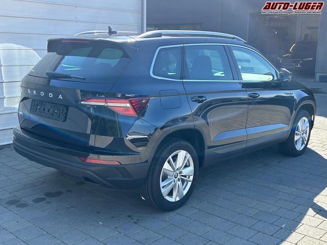 Skoda Karoq Extra 2.0 TDI DSG AHK*Android Auto*SHZ*ACC*Keyless*Kamera*17" LM* 2Z Klimaauto*SUNSET 