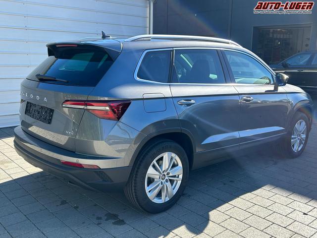Skoda Karoq Extra Plus 2.0 TDI DSG 4x4 AHK*Android Auto*Matrix*E-Heck*SHZ*ACC*Keyless*Kamera*17" LM* 2Z Klimaauto*SUNSET 