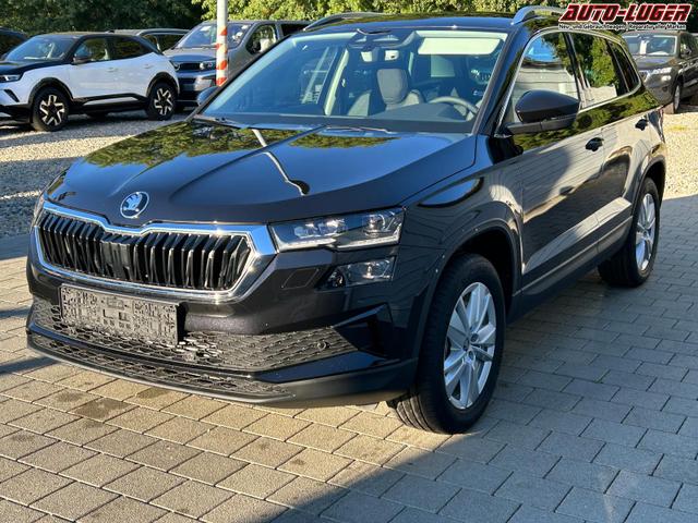 Skoda Karoq Extra Plus 2.0 TDI DSG 4x4 AHK*Android Auto*Matrix*E-Heck*SHZ*ACC*Keyless*Kamera*17" LM* 2Z Klimaauto*SUNSET 