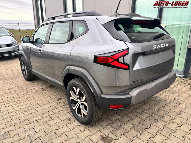 Dacia Duster Expression 1.6 HYBRID 140 AUTOMATIK (Benzin/Elektro), 17" Alufelgen "TERGAN", Klimaanlage, R&uuml;ckfahrkamera, Parksensoren hinten, LED-Scheinwerfer, Radio Media 10" + Smartphone-Spiegelung, Armlehne, Dachreling, Tempomat, Verkehrszeichenerkennung, Spurassistent 