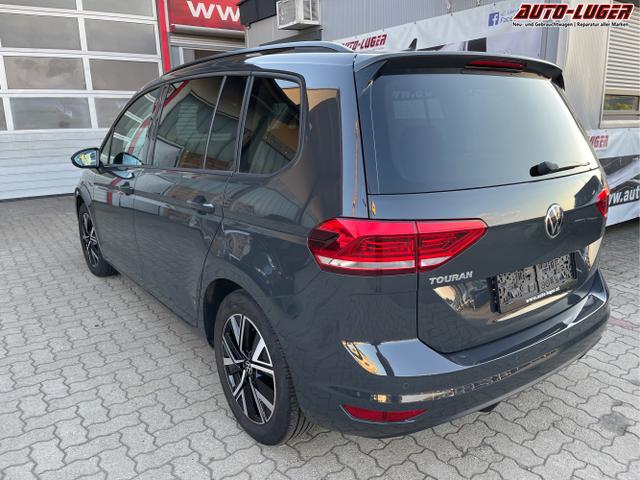 Seat / Ibiza / Grau / / / Touran 2.0 TDI Comfortline